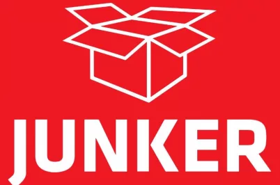 Junker Logo mit geöffneter Umzugskarton-Grafik auf rotem Hintergrund